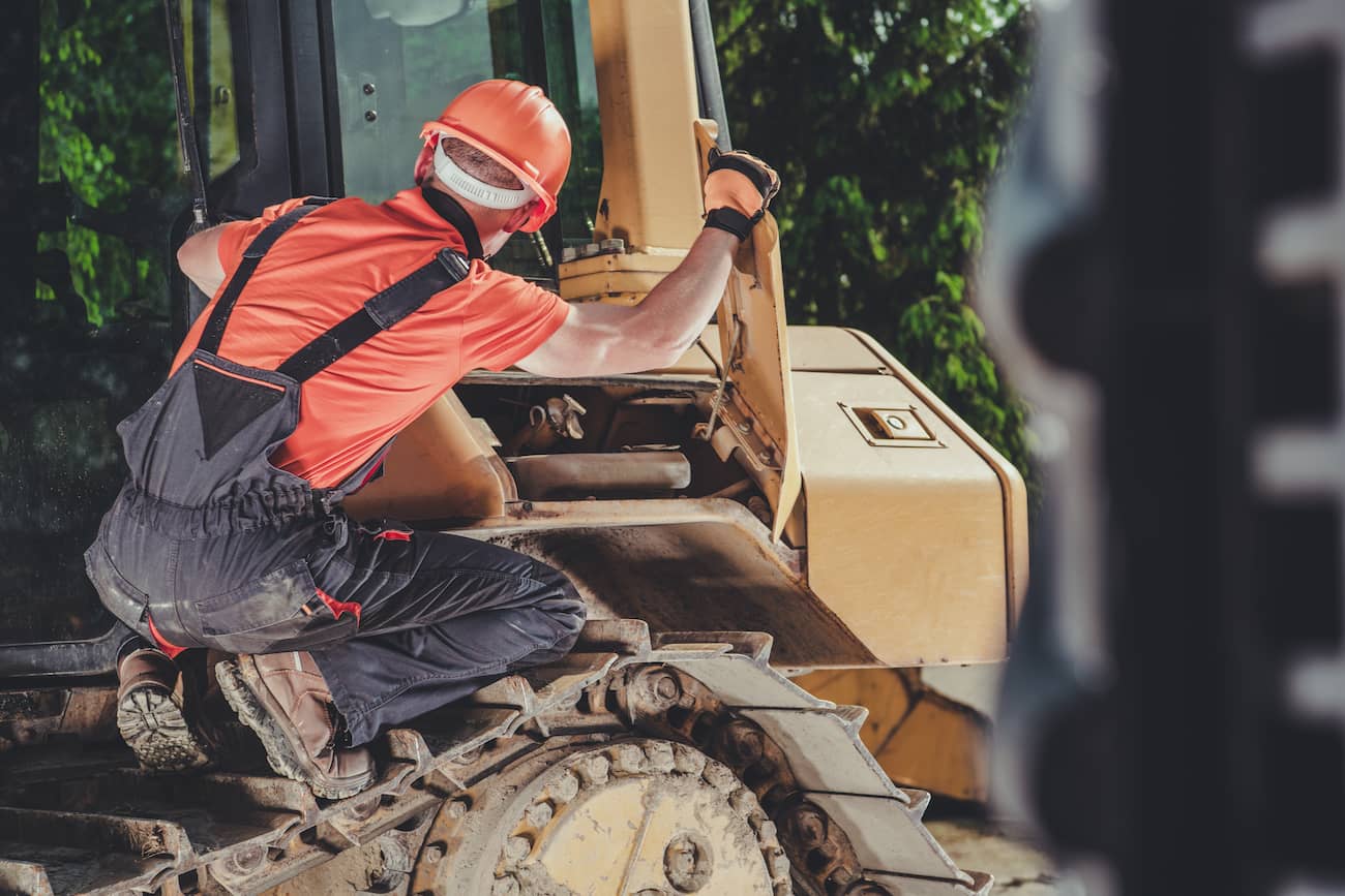 Man servicing machine