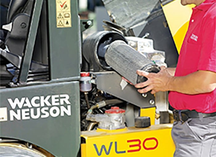 Man fixing equipment with parts